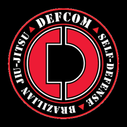 Defense Combatives - DEFCOM logo