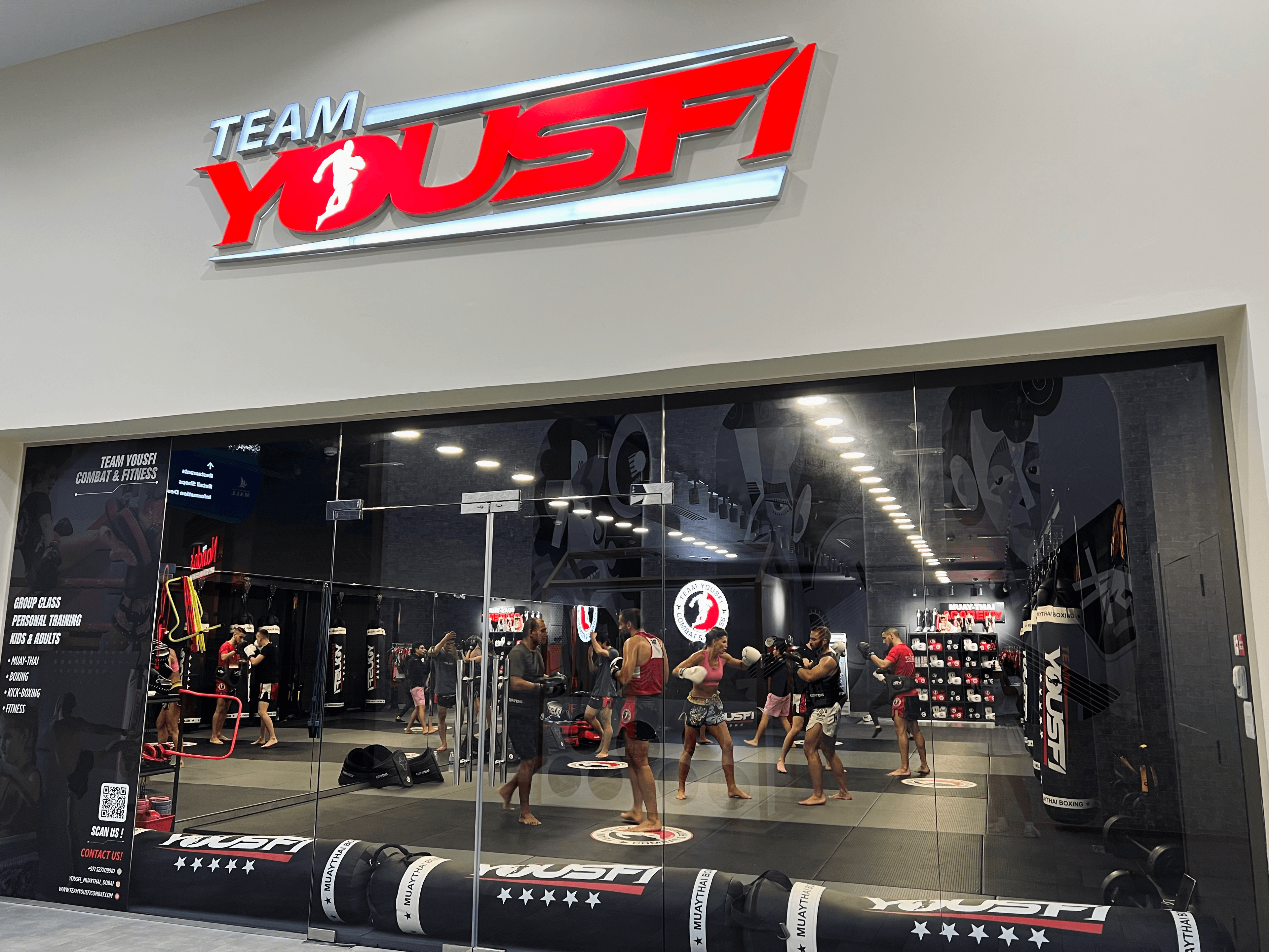 Team Yousfi Muay-Thai Combat & Fitness logo