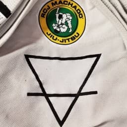 Arcanum combat jiu-jitsu academy logo