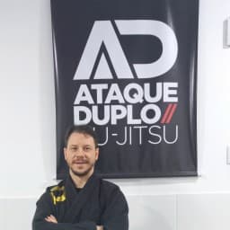 Ataque Duplo - Colégio Lótus logo