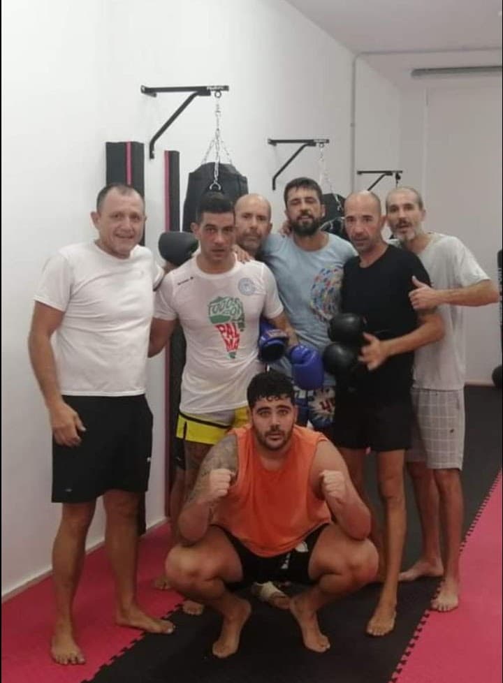 Escuela de Artes Marciales Misael Gotera logo
