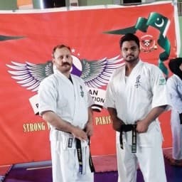 Hashmi kyokushin dojo pakistan logo