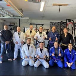 Roll with Aloha Jiu-Jitsu Academy logo