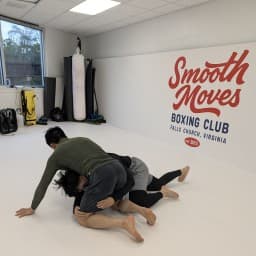 Smooth Moves Boxing Club logo